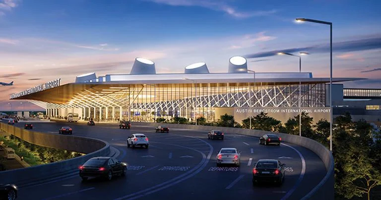 Austin–Bergstrom International Airport terminal exterior at dusk